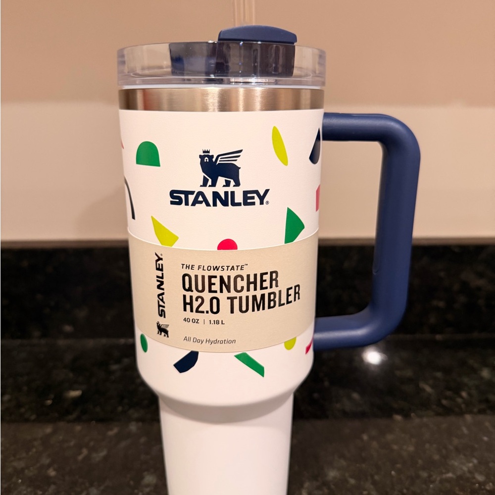 Stanley Quencher H2.0 Tumbler - White with Confetti Design And Blue Handle
